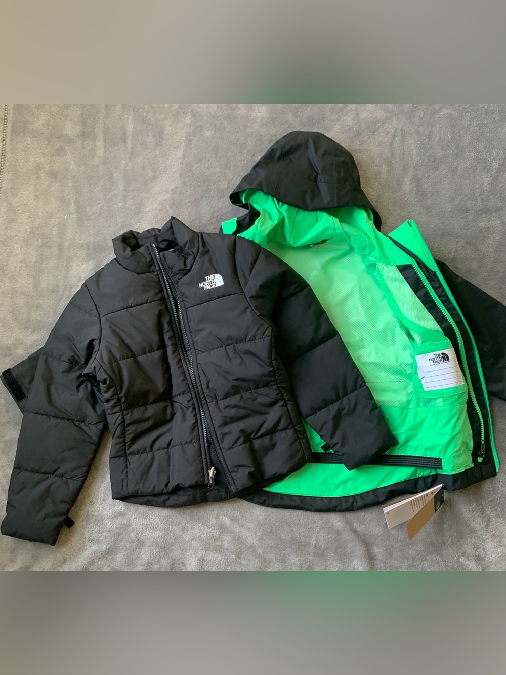 The North Face 2 Jackets in one.  Very stylish and colorful Green & Pink.